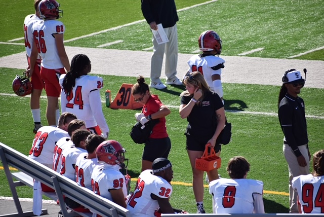 Athletic trainers at a football game